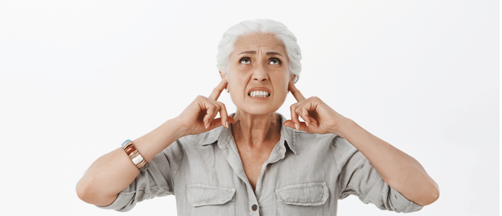How Hearing Loss Can Contribute to Depression? Let's Talk | Aanvii Hearing Person feeling isolated due to hearing loss, highlighting emotional impact and the need for hearing solutions by Aanvii Hearing.